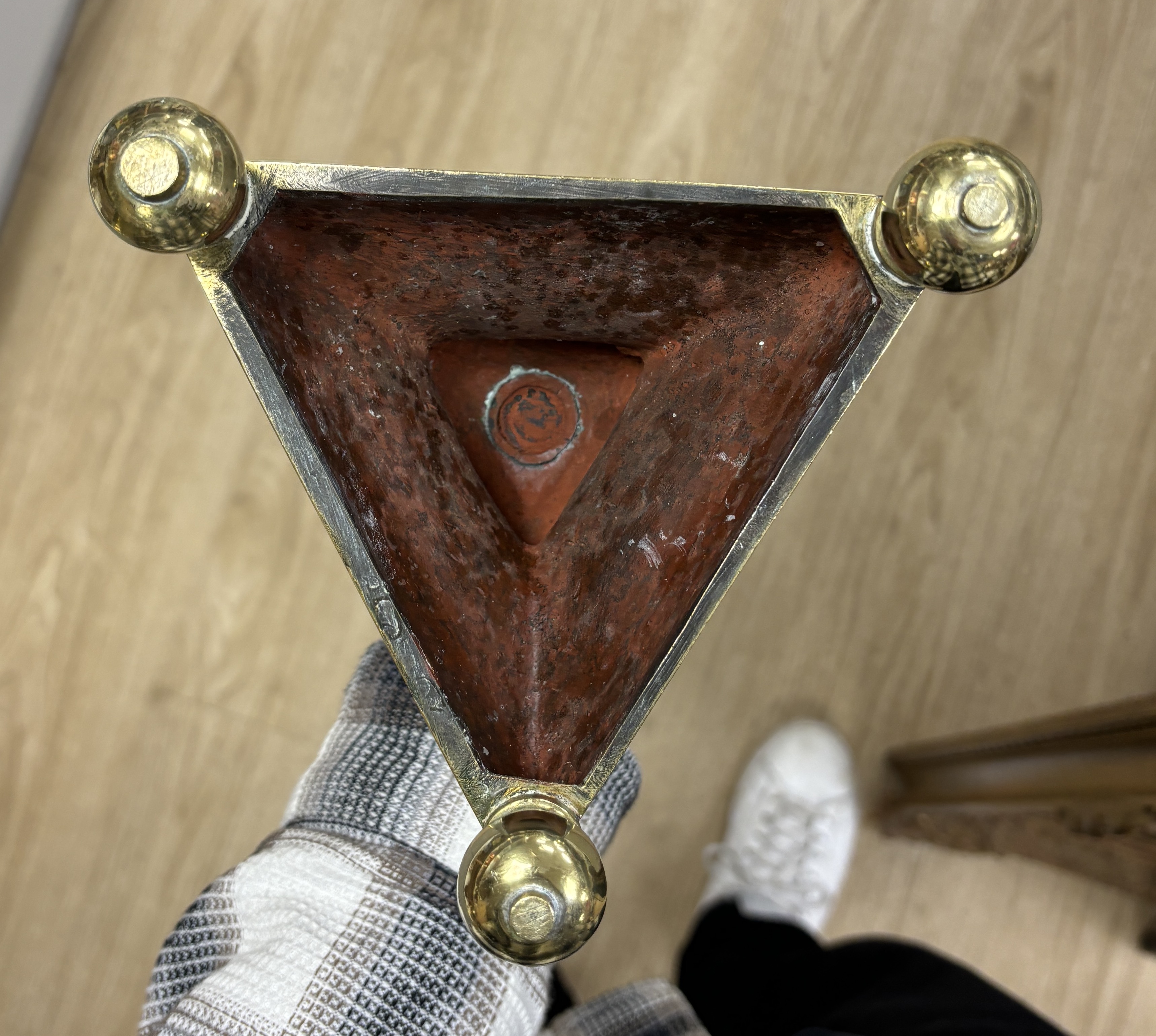 A pair of 17th Century Dutch brass pricket candlesticks, 58cm high